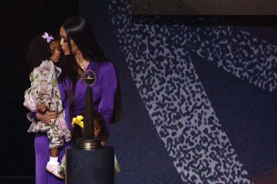 Vanessa Bryant holds her daughter, Capri, following the 2021 Basketball Hall of Fame Enshrinement Ceremony celebrating her late husband, Kobe Bryant.