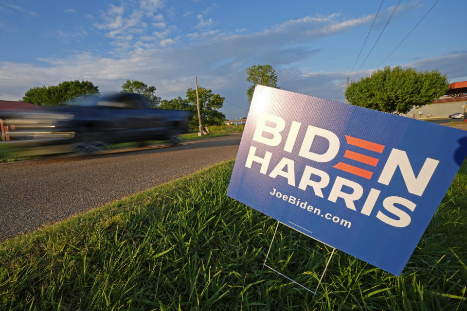 Traffic streaks past signage supporting President Joe Biden and Vice President Kamala Harris outside the Stronger Hope Church in Jackson, Miss., Thursday, June 27, 2024, prior to Biden's televised debate with former President Donald Trump. (AP Photo/Rogelio V. Solis)