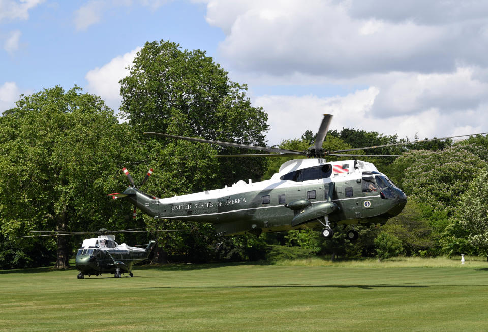 US President Donald Trump and his wife Melania arrive in Marine One at Buckingham Palace, in London on day one of his three day state visit to the UK.