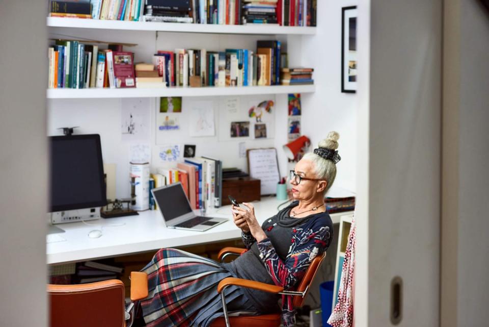 Woman sitting a cloffice