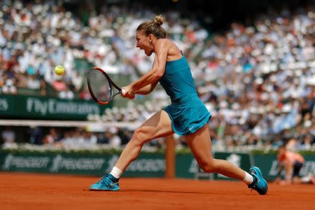 FILE PHOTO: Tennis - French Open - Roland Garros, Paris, France - June 9, 2018 Romania's Simona Halep in action during the final against Sloane Stephens of the U.S. REUTERS/Gonzalo Fuentes/File Photo