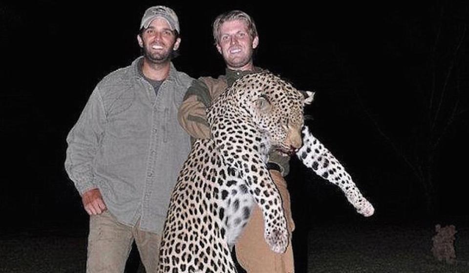 Eric and Donald Trump Jr. pose with one of their kills. (Photo: Hunting Legends)