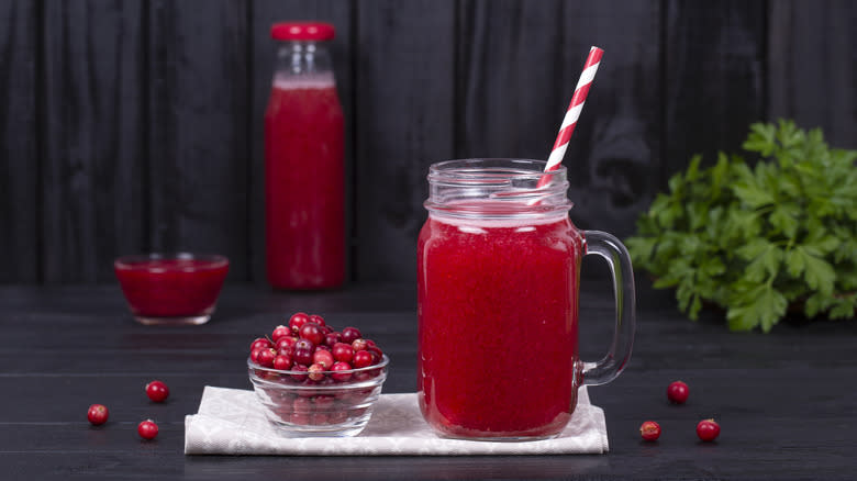 Cranberry juice drink with straw