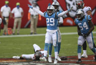 Carolina Panthers cornerback Corn Elder (29) celebrates after stopping Tampa Bay Buccaneers wide receiver Justin Watson (17) during the second half of an NFL football game Sunday, Sept. 20, 2020, in Tampa, Fla. (AP Photo/Jason Behnken)