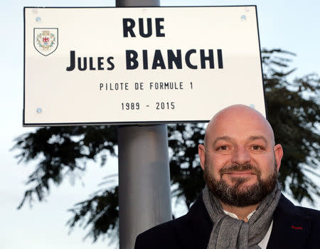 Philippe Bianchi, the father of Jules Bianchi Formula One driver who died on July 17, 2015 after an accident during the Japanese Grand Prix Formula 1 race on October 5, 2014, poses near the street plaque with his son's name during its inauguration in Nice, France, January 23, 2017. REUTERS/Eric Gaillard