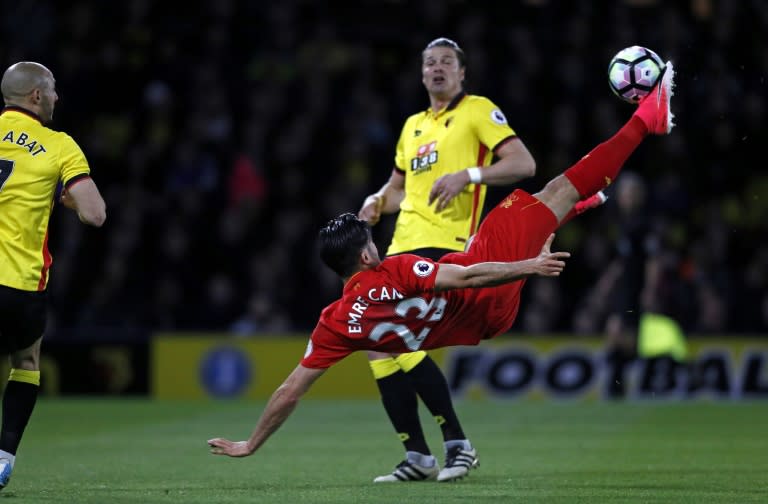 Liverpool's midfielder Emre Can connects with this overhead kick to score against Watford at Vicarage Road Stadium in Watford, north of London on May 1, 2017