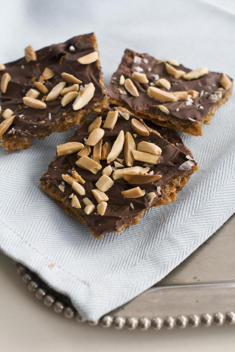 In this image taken on March 4, 2013, matzo toffee bar crunch served on a tray is shown in Concord, N.H. (AP Photo/Matthew Mead)