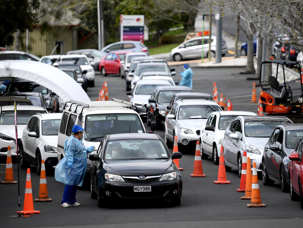People wait to get a Covid-19 test at the Northcote Covid-19 testing facility in Auckland on September 14 as the city remains on Alert Level 2.5  (Hannah Peters/Getty Images)