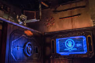 <p>Rocket (voiced by Bradley Cooper) has used his preternatural escape abilities to free himself from his cell and is ready to spring his fellow Guardians. (Photo: Disneyland Resort) </p>