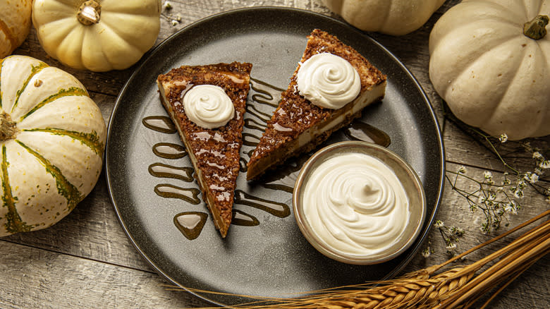 Pumpkin pie with syrup and cream