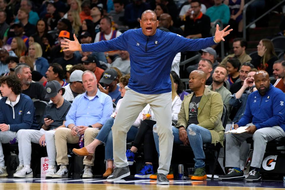 Philadelphia 76ers coach Doc Rivers reacts to a foul call during the second half of the team's NBA basketball game against the Phoenix Suns, Saturday, March 25, 2023, in Phoenix. The Suns won 125-105. (AP Photo/Rick Scuteri)