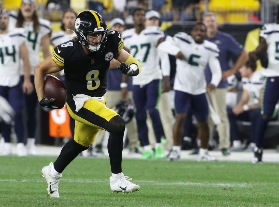 Pittsburgh Steelers quarterback Kenny Pickett scrambles during the fourth quarter against the Seattle Seahawks.