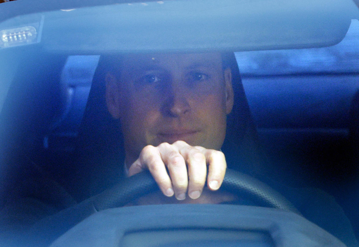 Prince William, behind the wheel of an automobile.