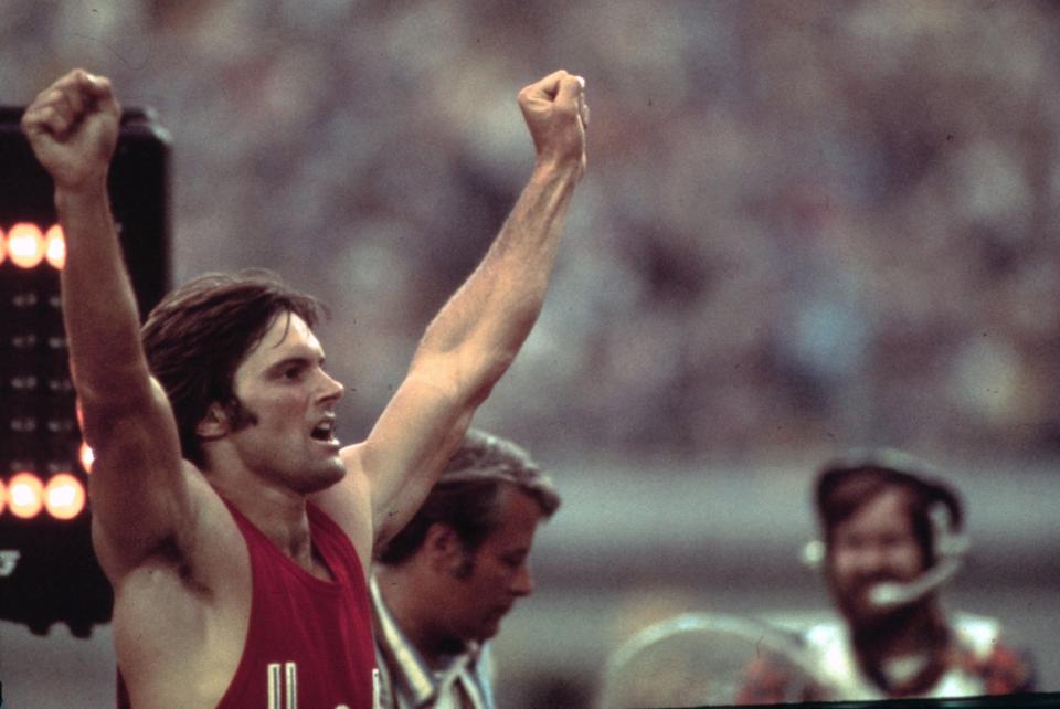 <p>In the 1976 Montreal Olympics, Bruce Jenner (now Caitlyn Jenner) won the decathlon, and earned the title of “world’s greatest athlete.” His win came at the height of the Cold War, giving a new definition to patriotism. His celebration of waving the American flag afterwards started a tradition within the Olympics that still stands today. (Getty) </p>