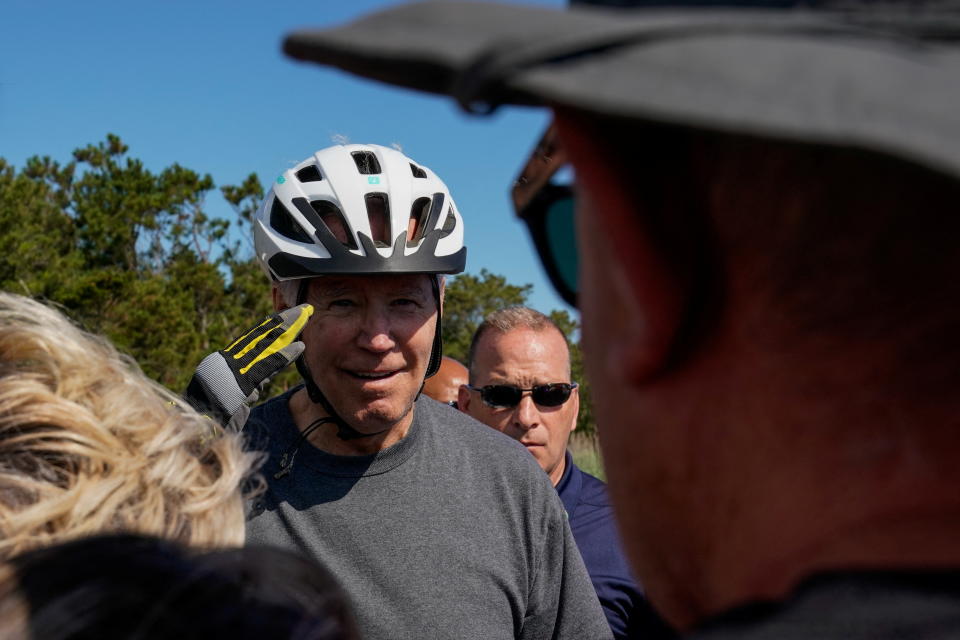 Biden continues to talk with members of the public after his fall