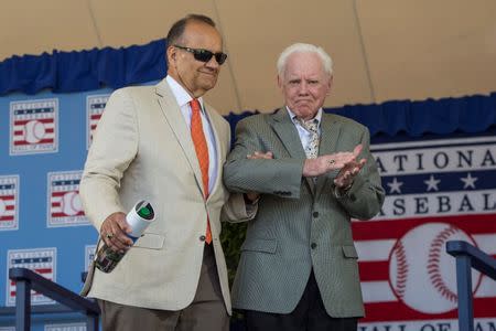 Jul 24, 2016; Cooperstown, NY, USA; Hall of Famer Joe Torre and Hall of Famer Whitey Ford after being introduced during the 2016 MLB baseball hall of fame induction ceremony at Clark Sports Center. Mandatory Credit: Gregory J. Fisher-USA TODAY Sports