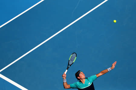 Tennis - Australian Open - Fourth Round - Melbourne Park, Melbourne, Australia, January 21, 2019. Canada’s Milos Raonic serves to Germany's Alexander Zverev. REUTERS/Lucy Nicholson