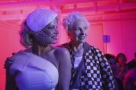 Actress Pamela Anderson, left, and designer Vivienne Westwood pose for photographers prior to the Vivienne Westwood Ready To Wear Spring-Summer 2020 collection, unveiled during the fashion week, in Paris, Saturday, Sept. 28, 2019. (Photo by Vianney Le Caer/Invision/AP)