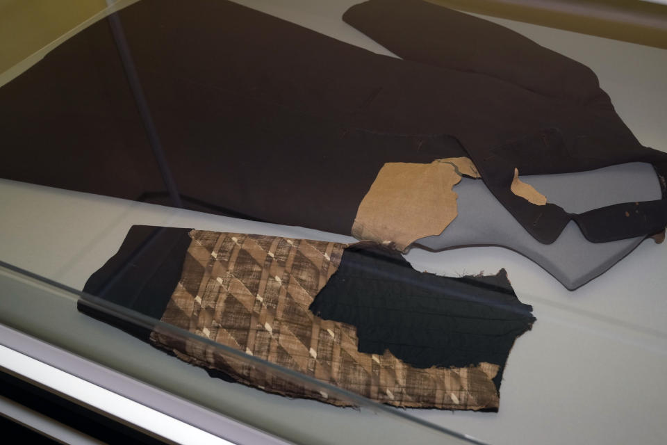 The Brooks Brothers coat worn by President Abraham Lincoln on the night he was assassinated is displayed as part of the Met Museum Costume Institute's exhibit "In America: A Lexicon of Fashion," Saturday, April 30, 2022, in New York. (Photo by Charles Sykes/Invision/AP)