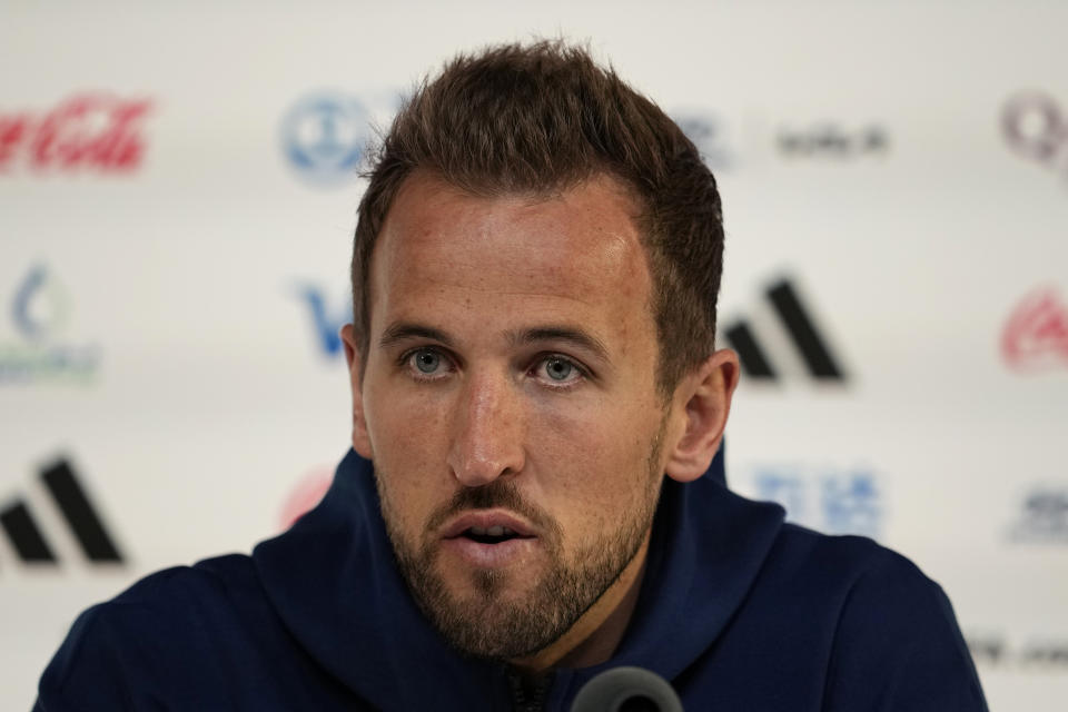 England's Harry Kane speaks to the media during a press conference at the Qatar National Convention Center on the eve of the quarterfinal World Cup soccer match between France and England, in Doha, Qatar, Friday, Dec. 9, 2022. (AP Photo/Abbie Parr)