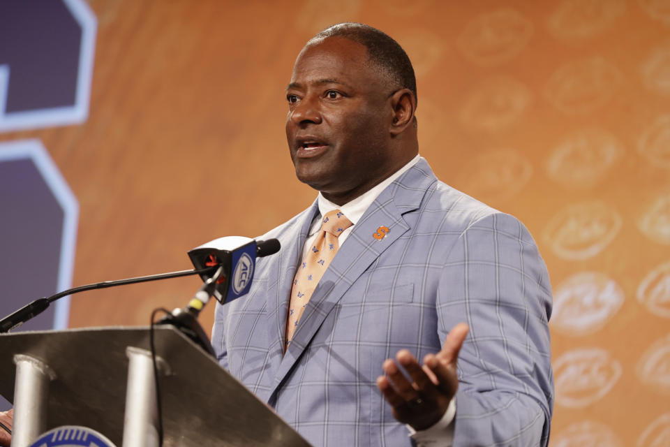 FILE - Syracuse head coach Dino Babers answers a question at the NCAA college football Atlantic Coast Conference Media Days in Charlotte, N.C., Wednesday, July 20, 2022. Babers enters his seventh season at Syracuse with high hopes there won't be a repeat of last year when the team was poised for a solid finish, then flopped. (AP Photo/Nell Redmond, File)