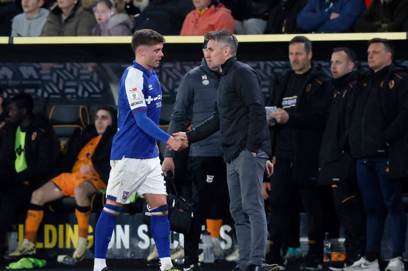 Ipswich Town's Leif Davis, left, leaves the pitch with an injury during their draw away to Hull City -Credit:PA