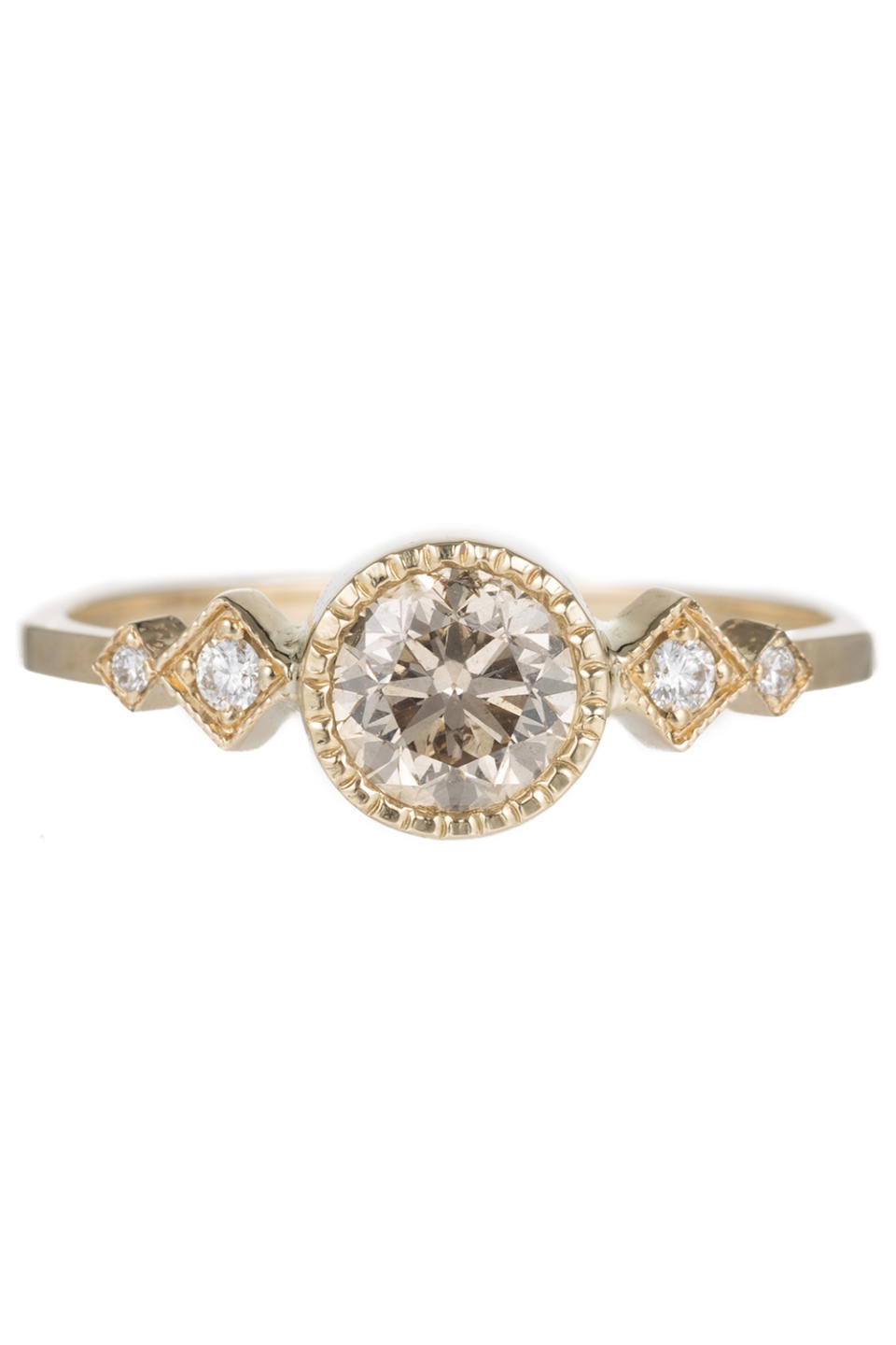 <p><em>Champagne Diamond Solitaire Echo Ring in 14k Yellow Gold</em><em>, JENNIE KWON DESIGNS, $2,200</em><br></p><p><a rel="nofollow noopener" href="https://jenniekwondesigns.com/products/champagne-diamond-solitaire-echo-ring" target="_blank" data-ylk="slk:BUY NOW;elm:context_link;itc:0;sec:content-canvas" class="link ">BUY NOW</a></p>