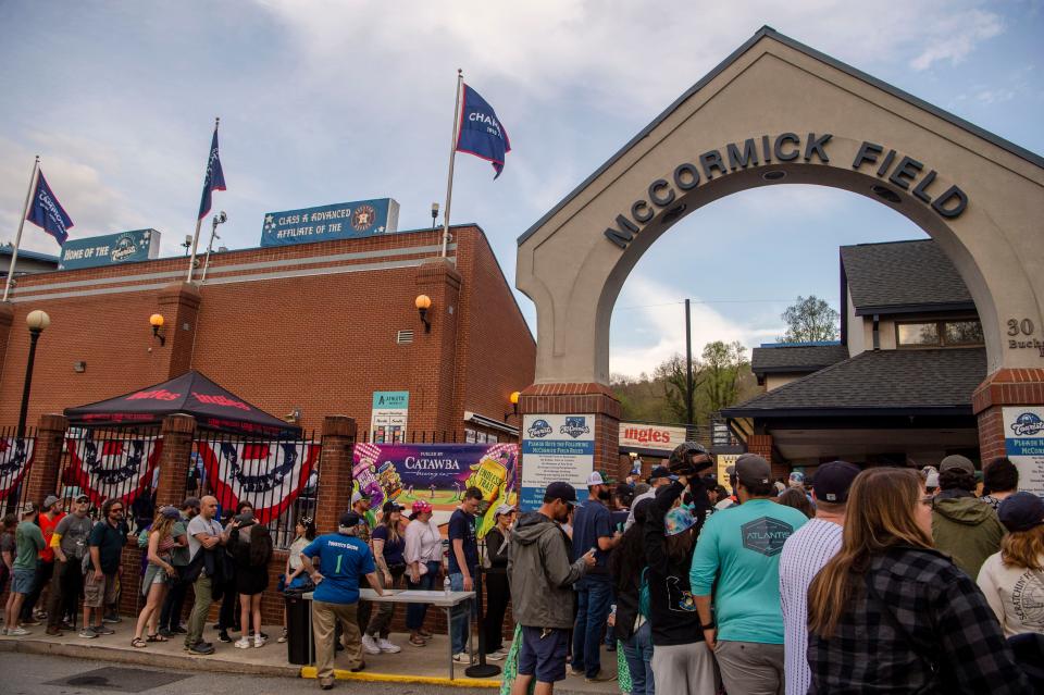 Baseball fans wait to enter McCormick Field for the Tourists' season opener against the Bowling Green Hot Rods April 6, 2023.
