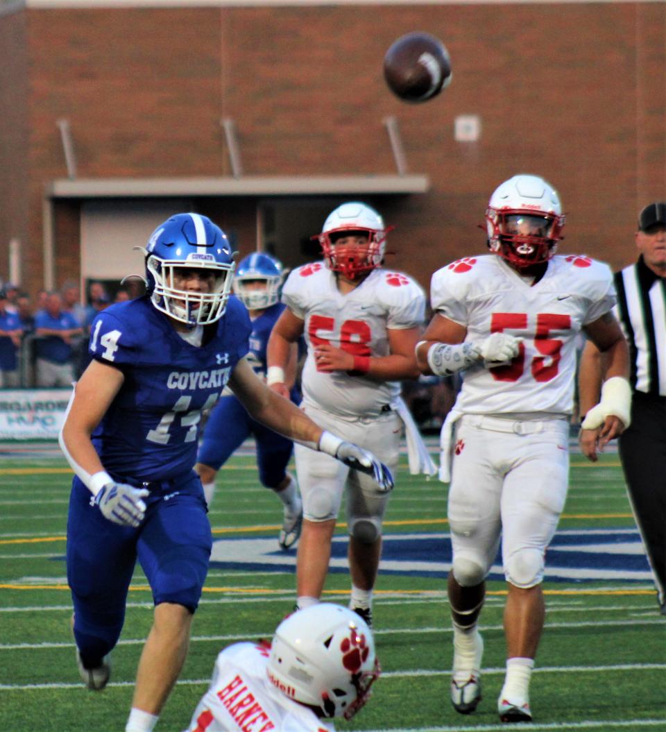 Linebacker Tate Kruer (14) led Covington Catholic with seven tackles in a 56-6 win over Grant County.