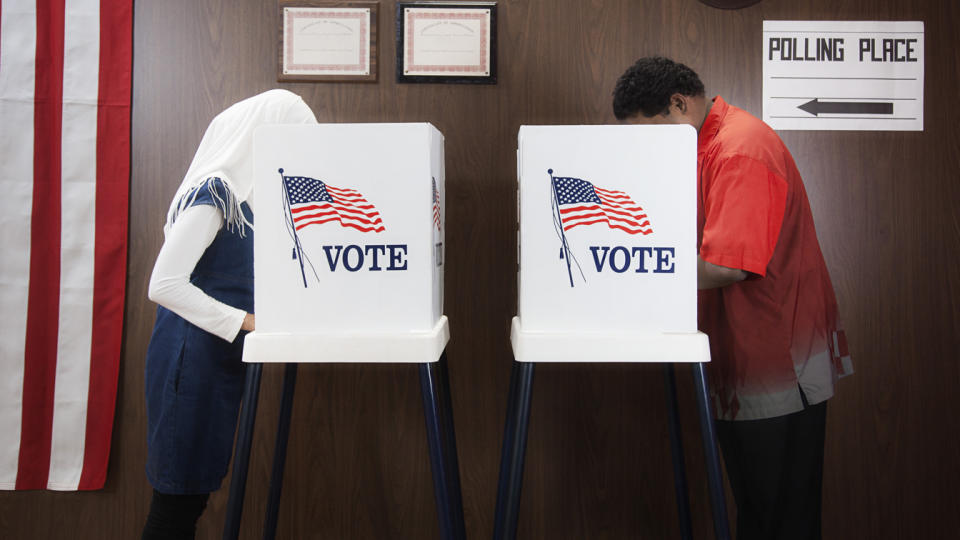 At a polling place, voters cast their vote.