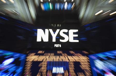 The logo of the New York Stock Exchange is pictured in this "zoom effect" photo from the floor of the exchange in New York, October 14, 2013. REUTERS/Carlo Allegri