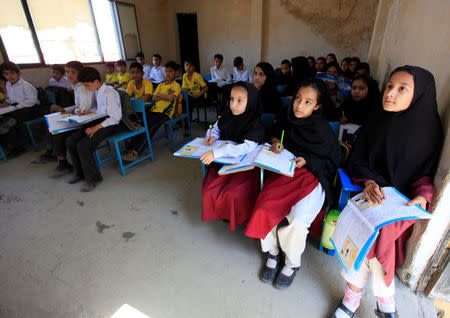 Children attend a class at Khushal school that Nobel Peace Prize laureate Malala Yousafzai used to attend, in her hometown of Mingora in Swat Valley, Pakistan March 30, 2018. REUTERS/Faisal Mahmood