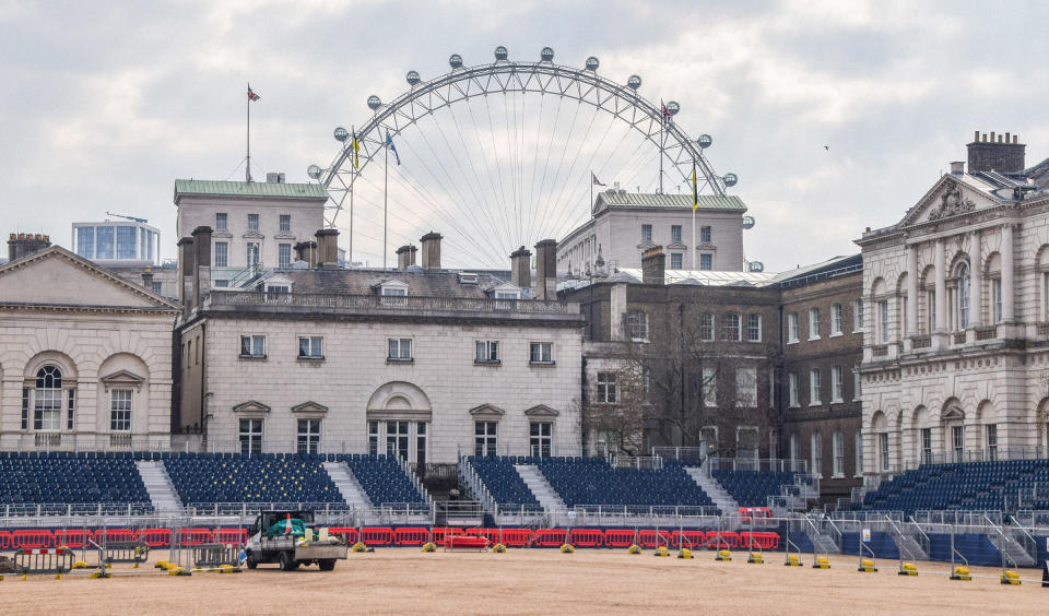 Workers install seats at Horse Guards Parade on April 17.<span class="copyright">Vuk Valcic—SOPA Images/Shutterstock</span>