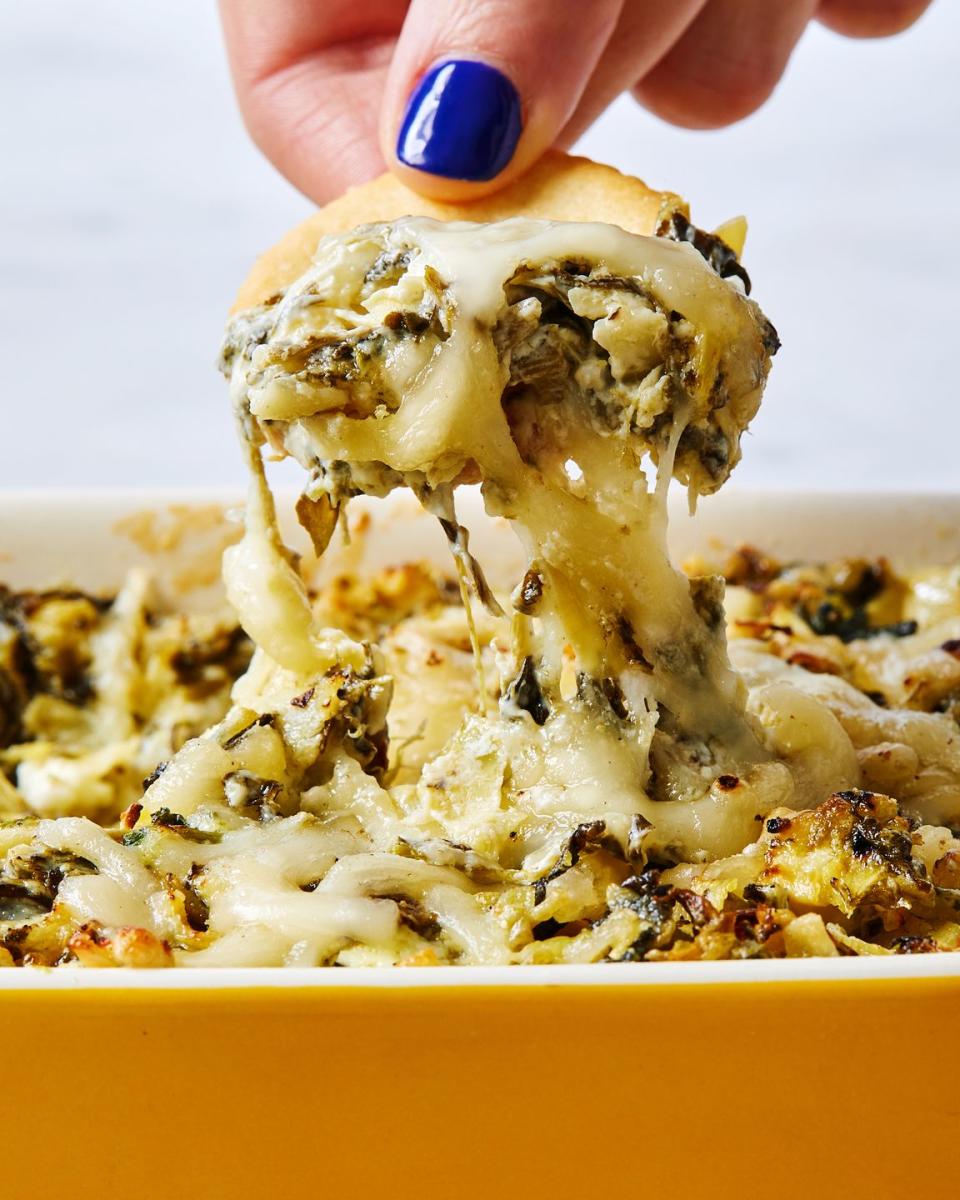 <p>A creamy, cheesy <a href="https://www.delish.com/cooking/recipe-ideas/a57633/baked-spinach-artichoke-dip-recipe/" rel="nofollow noopener" target="_blank" data-ylk="slk:spinach artichoke dip;elm:context_link;itc:0;sec:content-canvas" class="link ">spinach artichoke dip</a> that’s completely <a href="https://www.delish.com/uk/cooking/recipes/g34299337/easy-vegan-recipes/" rel="nofollow noopener" target="_blank" data-ylk="slk:vegan;elm:context_link;itc:0;sec:content-canvas" class="link ">vegan</a>? Not possible! Oh, but it is. Vegan (and kosher) alternatives to cheeses and mayonnaise are thankfully much more common in most grocery stores, making one of our favorite dips and <a href="https://www.delish.com/cooking/recipe-ideas/g2168/bite-size-appetizers/" rel="nofollow noopener" target="_blank" data-ylk="slk:appetizers;elm:context_link;itc:0;sec:content-canvas" class="link ">appetizers</a> more enjoyable for everyone. </p><p>Get the <strong><a href="https://www.delish.com/cooking/recipe-ideas/a42270943/vegan-spinach-artichoke-dip-recipe/" rel="nofollow noopener" target="_blank" data-ylk="slk:Vegan Spinach Artichoke Dip recipe;elm:context_link;itc:0;sec:content-canvas" class="link ">Vegan Spinach Artichoke Dip recipe</a></strong>.</p>