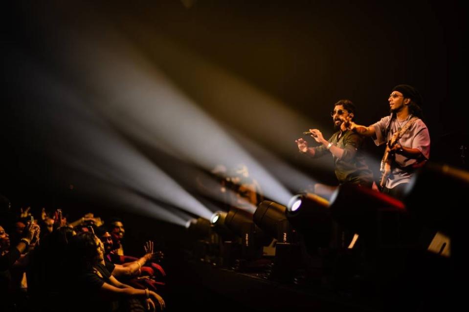 On stage: the crowd enjoying the showmanship of Vian Fernandes (right) and Christin Hanna Jos (left). — Pic by Barathan Amuthan.