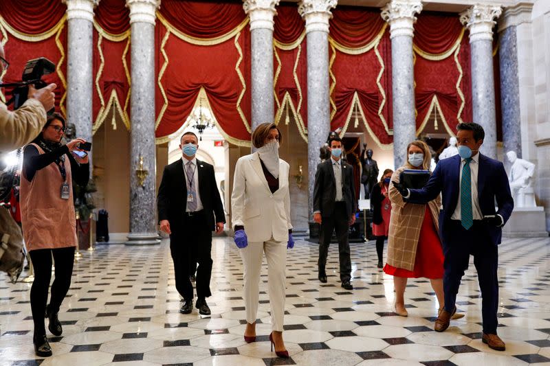 Members of House of Representatives gather ahead of vote on coronavirus relief bill in Washington