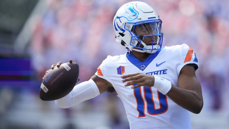 Boise State quarterback Taylen Green warms up before a college football game against Washington on Sept. 2, 2023, in Seattle.