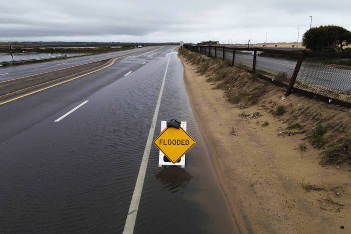 Part of the Pacific Coast Highway near Huntington Beach closed due to flooding on Feb. 1.