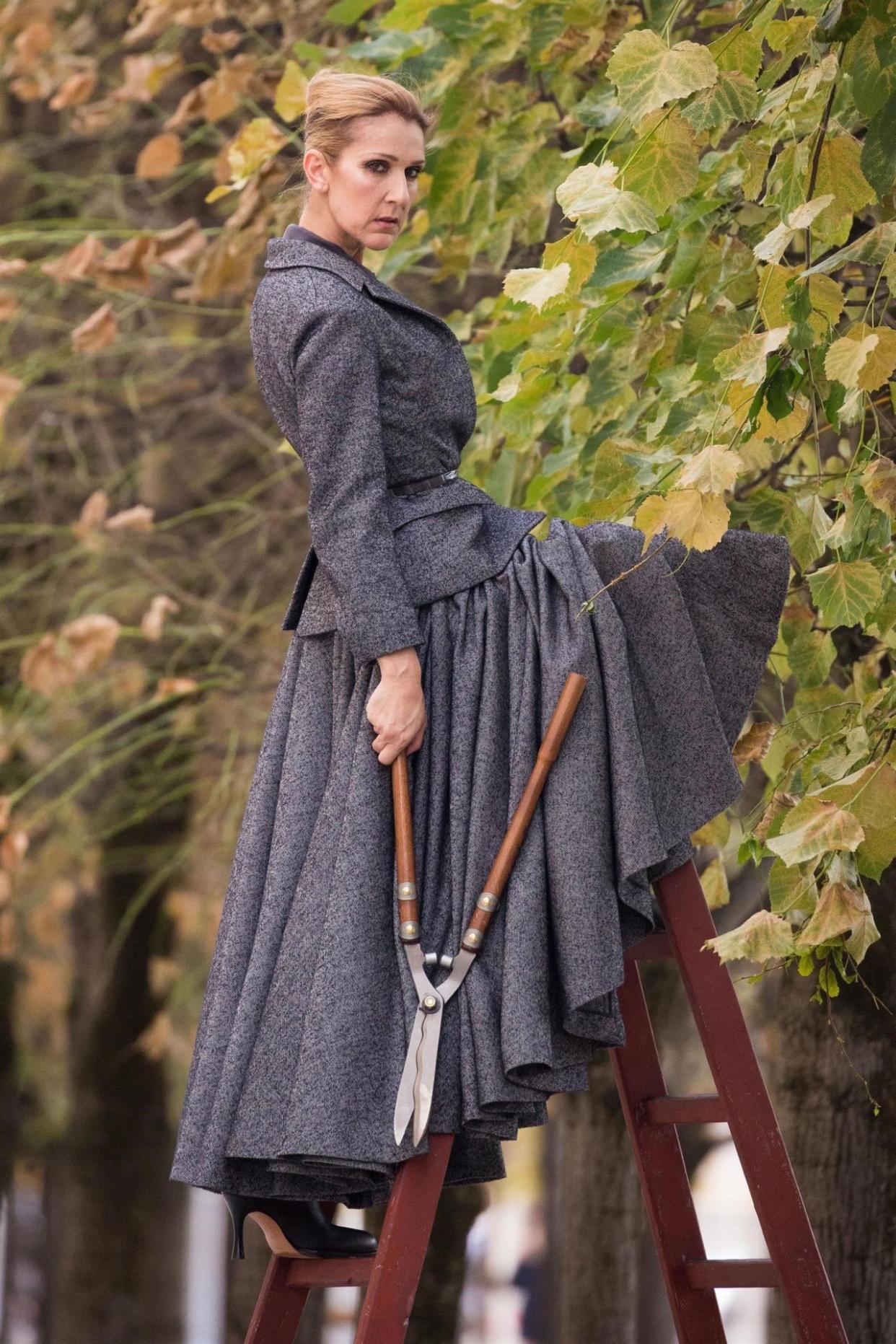 ** RIGHTS: ONLY UNITED STATES, CANADA ** Paris, FRANCE  - Singer Celine Dion is spotted doing a photo shoot in the garden of the Palais Royal in Paris, France. Celine was wearing a turn of the century grey dress with a wide brim black hat.Pictured: Celine DionBACKGRID USA 6 JULY 2017 BYLINE MUST READ: Best Image / BACKGRIDUSA: +1 310 798 9111 / usasales@backgrid.comUK: +44 208 344 2007 / uksales@backgrid.com*UK Clients - Pictures Containing ChildrenPlease Pixelate Face Prior To Publication*