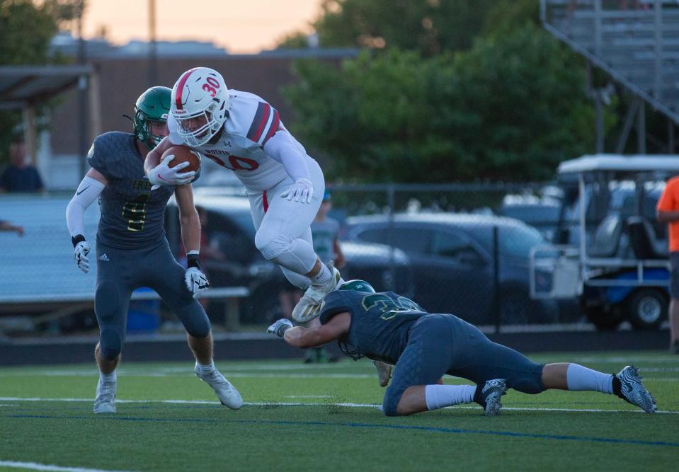 Reeds Spring tight end Caden Wiest runs for a touchdown at Springfield Catholic on September 17, 2021.