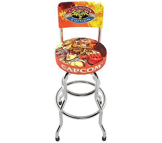 <p><a href="https://go.redirectingat.com?id=74968X1596630&url=https%3A%2F%2Fwww.qvc.com%2Farcade1up-street-fighter-ii-swivel-stool.product.E309592.html&sref=https%3A%2F%2F" rel="nofollow noopener" target="_blank" data-ylk="slk:Shop Now;elm:context_link;itc:0;sec:content-canvas" class="link rapid-noclick-resp">Shop Now</a></p><p>Street Fighter II Swivel Stool</p><p>qvc.com</p><p>$99.99</p>