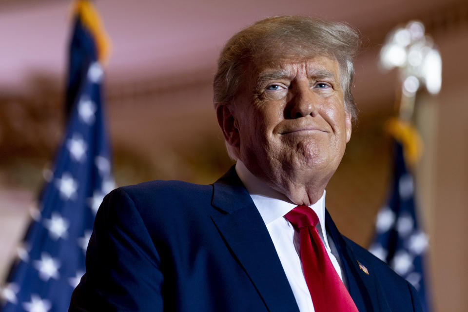 FILE - Former President Donald Trump announces he is running for president for the third time as he smiles while speaking at Mar-a-Lago in Palm Beach, Fla., Nov. 15, 2022. Trump's early announcement of his third White House bid won't shield the former president from the criminal investigations already confronting him as an ordinary citizen, leaving him legally and politically exposed as he seeks the 2024 Republican nomination. (AP Photo/Andrew Harnik, File)