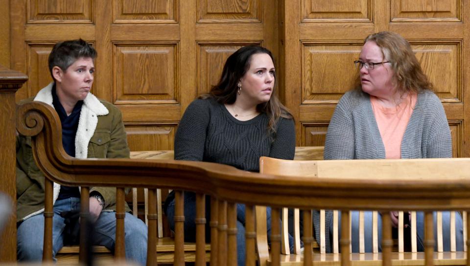 Former Stark County Sheriff Detective Amber Davis, Katie Marskell and Stacy Corp react during the sentencing of Lindsey Abbuhl on felony endangering children and felony theft in the Stark County Courtroom of Judge Chryssa Hartnett.  Thursday,  November 17, 2022.