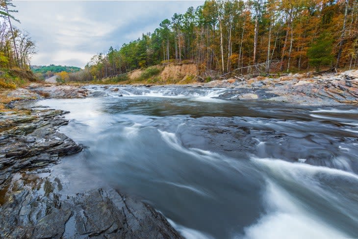 <span class="article__caption">Leaves turn with autumn in the Ouachita Mountains.</span> (Photo: Dennis_Casey / iStock / Getty Images Plus via Getty Images)