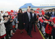 <p>Children wave U.S. and Chinese flags as President Donald Trump and first lady Melania Trump arrive at Beijing Airport, Wednesday, Nov. 8, 2017, in Beijing. (Photo: Pang Xinglei/Xinhua via AP) </p>