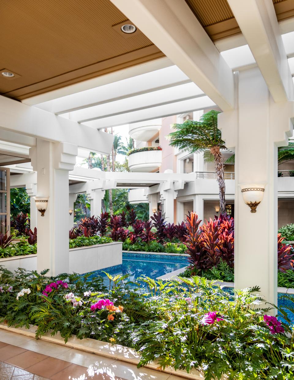 The open-air lobby has so many plants that you would think you're in a botanical garden.