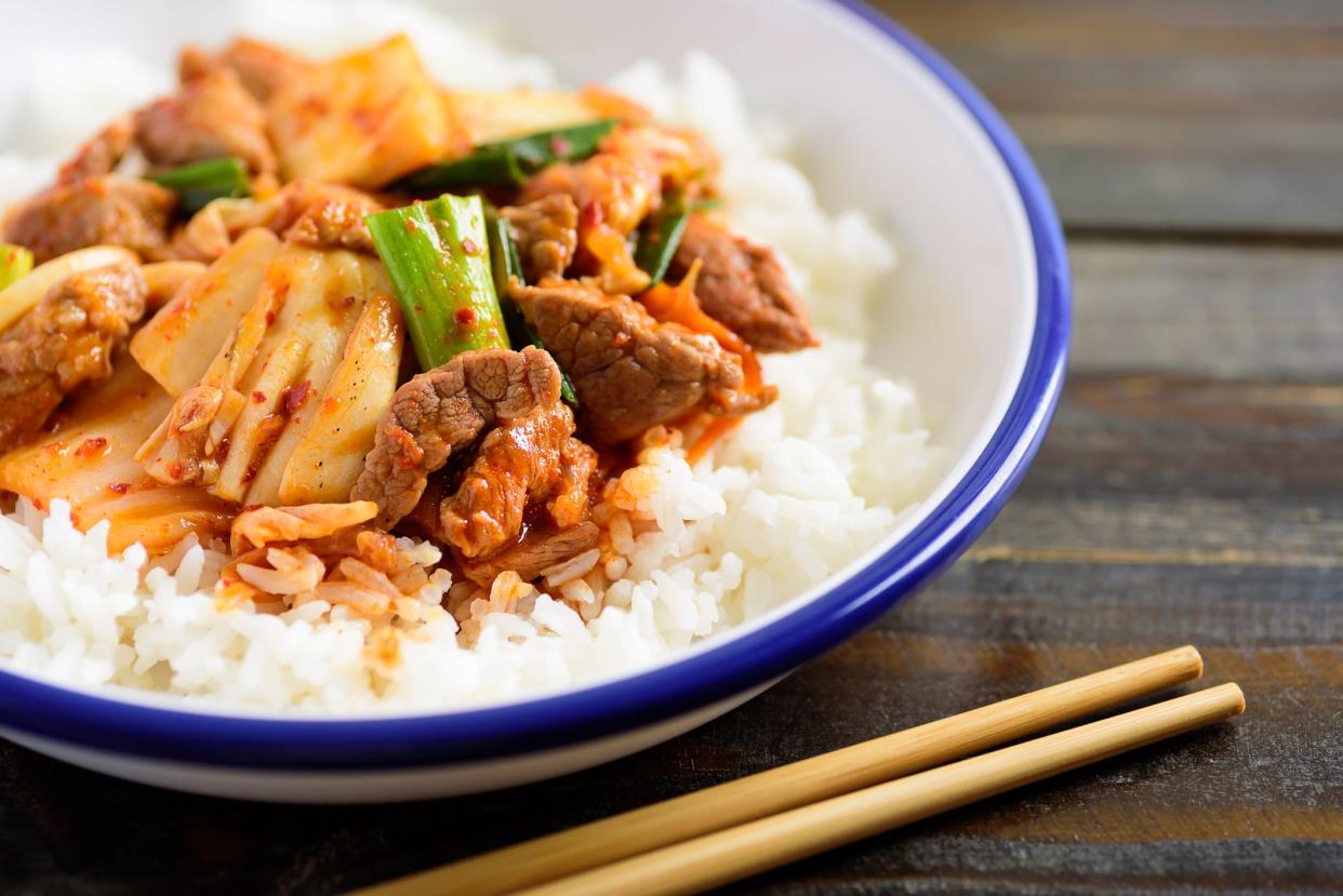 Stir-fried pork with kimchi eating with rice, Korean food