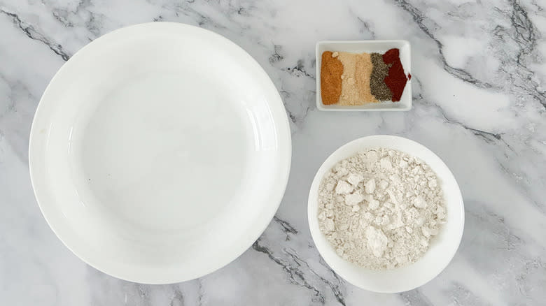empty bowl, flour, and various seasonings