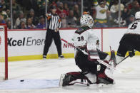 Arizona Coyotes goaltender Connor Ingram (39) kneels outside the net after the Minnesota Wild scored a goal during the third period of an NHL hockey game Sunday, Nov. 27, 2022, in St. Paul, Minn. (AP Photo/Stacy Bengs)