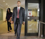 Former Minneapolis FBI agent Terry Albury walks out of the Federal Courthouse in St. Paul Thursday, Oct. 18, 2018 after Albury was sentenced to four years in prison for leaking classified defense documents to a reporter. (Shari L. Gross/Star Tribune via AP)